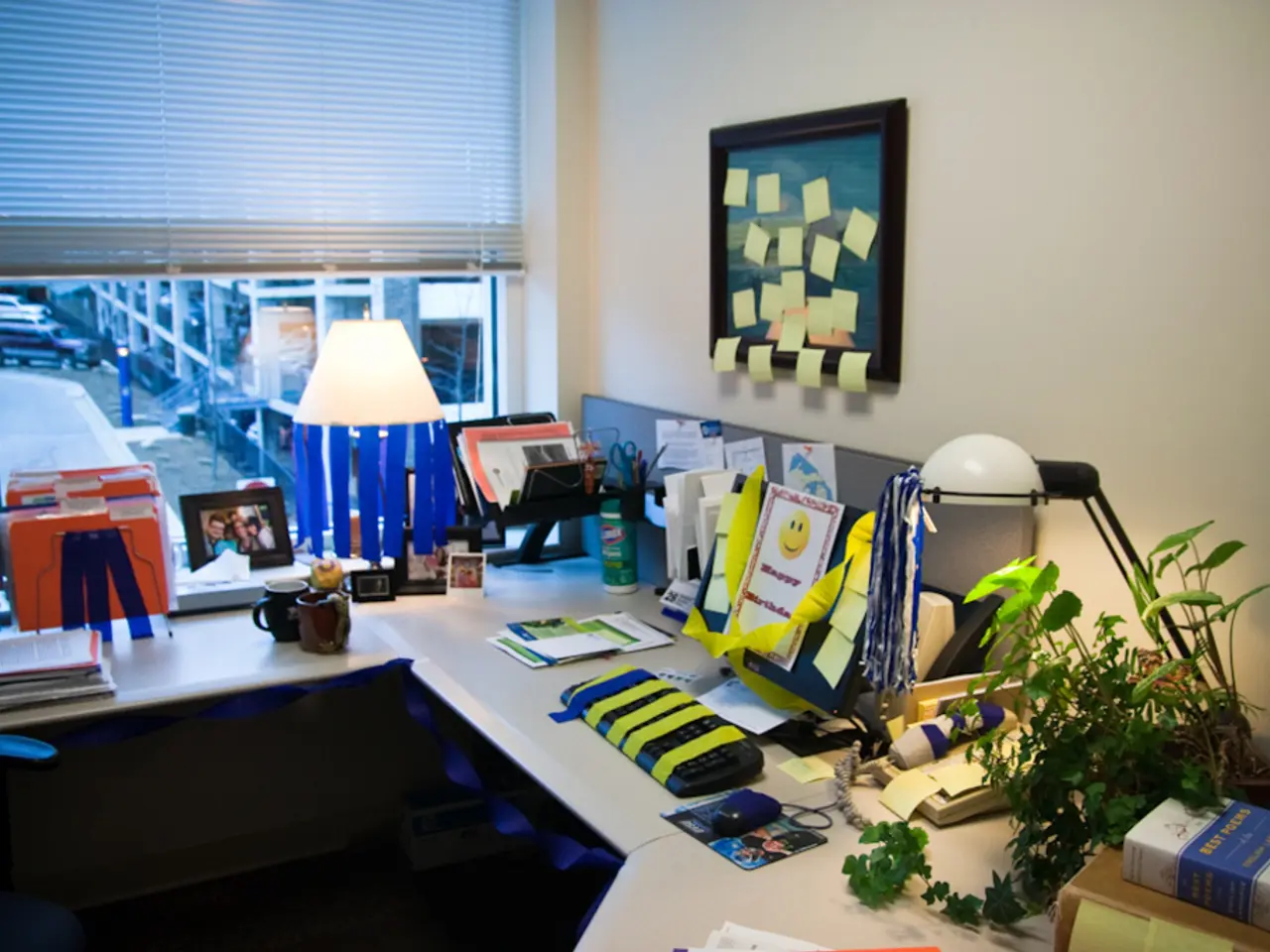 In this image there is a view of inside of a room, there is a table towards the bottom of the...