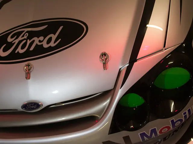 Electronic Acura RSX Prototype SUV Demonstrates Sleek Headlights and Glowing Emblem