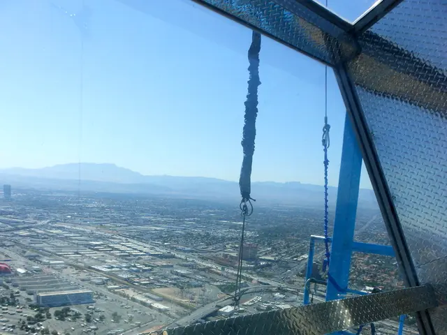 This is the aerial view image of a town with homes and trees on the land, on the left side it seems...