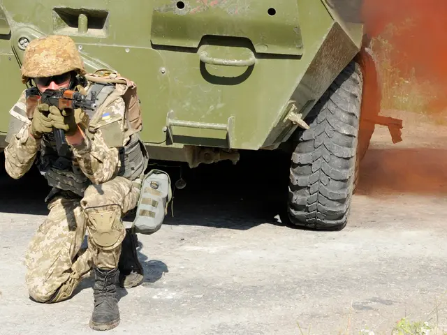 In this image, we can see a person wearing clothes and holding a gun with his hands. There is a...