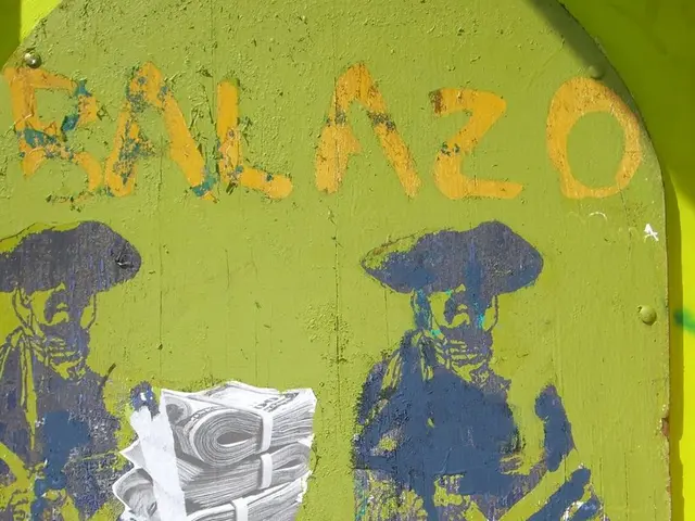 In this picture there is a green color wooden board with some painted craft.