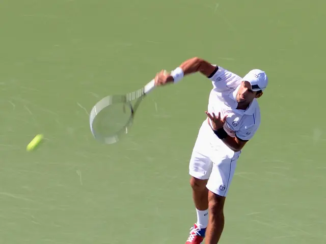In this image we can see a person wearing white color dress playing tennis holding tennis racket in...