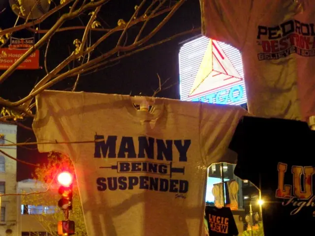 This picture describes about group of people, and we can see few T-shirts, in the background we can...